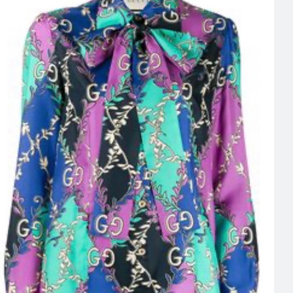 Gucci blouse been used a couple of times.silk